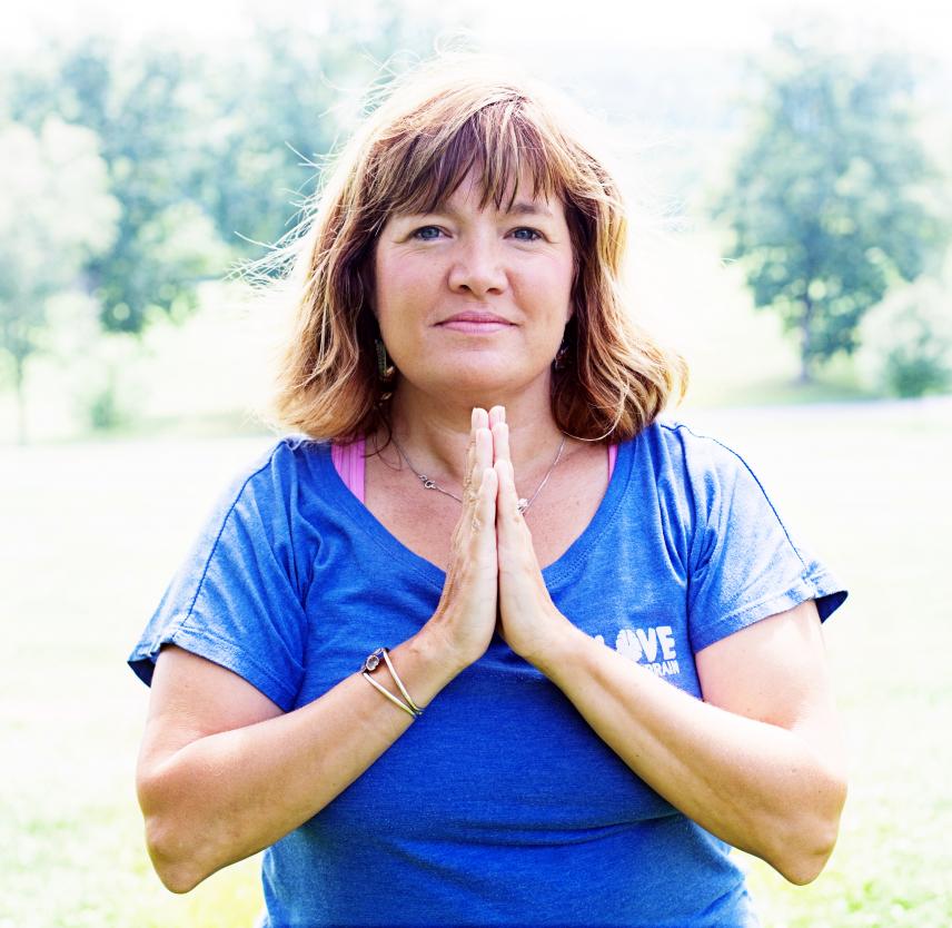 Nicole looking into camera with pals together in front of her chest. Nicole looking into camera with pals together in front of her chest.
