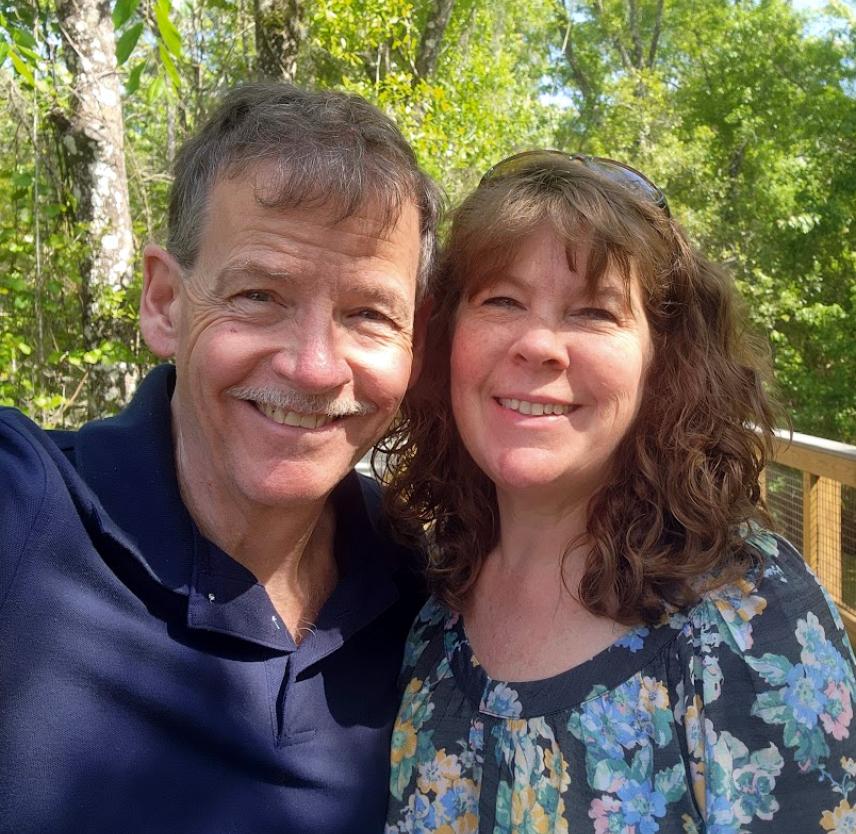 David and his wife in the woods