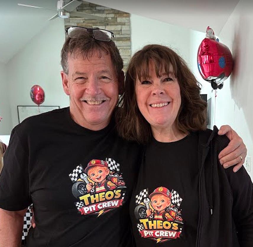 A smiling David Grant and his wife.