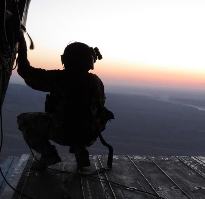 Mazar-E-Sharif, Afghanistan 05.06.2013 A crew member of Taskforce Iron Warrior observes the land below while transporting Soldiers and equipment to their respective locations. (U.S. Army photo by 2nd Lt. Charles Morgan) Mazar-E-Sharif, Afghanistan 05.06.2013 A crew member of Taskforce Iron Warrior observes the land below while transporting Soldiers and equipment to their respective locations. (U.S. Army photo by 2nd Lt. Charles Morgan)