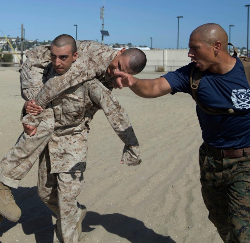A recruit carries another recruit during the Confidence Course at Marine Corps Recruit Depot San Diego, Sept. 17. Marine Corps Pfc. Cristian Torres Cruel to be Kind: A recruit carries another recruit during the Confidence Course at Marine Corps Recruit Depot San Diego, Sept. 17. Marine Corps Pfc. Cristian Torres