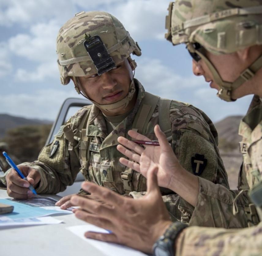 U.S. Army Soldiers assigned to Combined Joint Task Force – Horn of Africa discuss land navigation during training in preparation for an Expert Infantryman Badge evaluation at Arta Range, Djibouti, Jan. 25, 2018. Army Photo by SSgt Timothy Moore The Mastery Paradox - U.S. Army Soldiers assigned to Combined Joint Task Force Horn of Africa discuss land navigation during training in preparation for an Expert Infantryman Badge evaluation at Arta Range, Djibouti. Army Photo by SSgt Timothy Moore