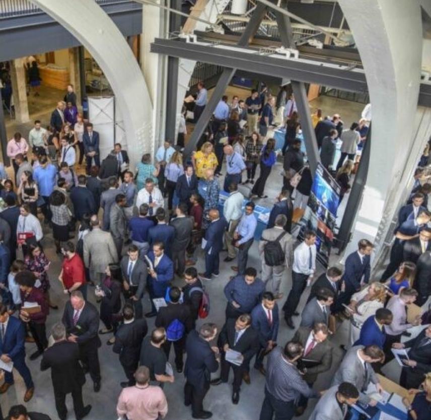 The Networking Paradox - Veterans networking at Naval Surface Warfare Center, Philadelphia Division (NSWCPD) career fair (U.S. Navy photo by Keegan Rammel)