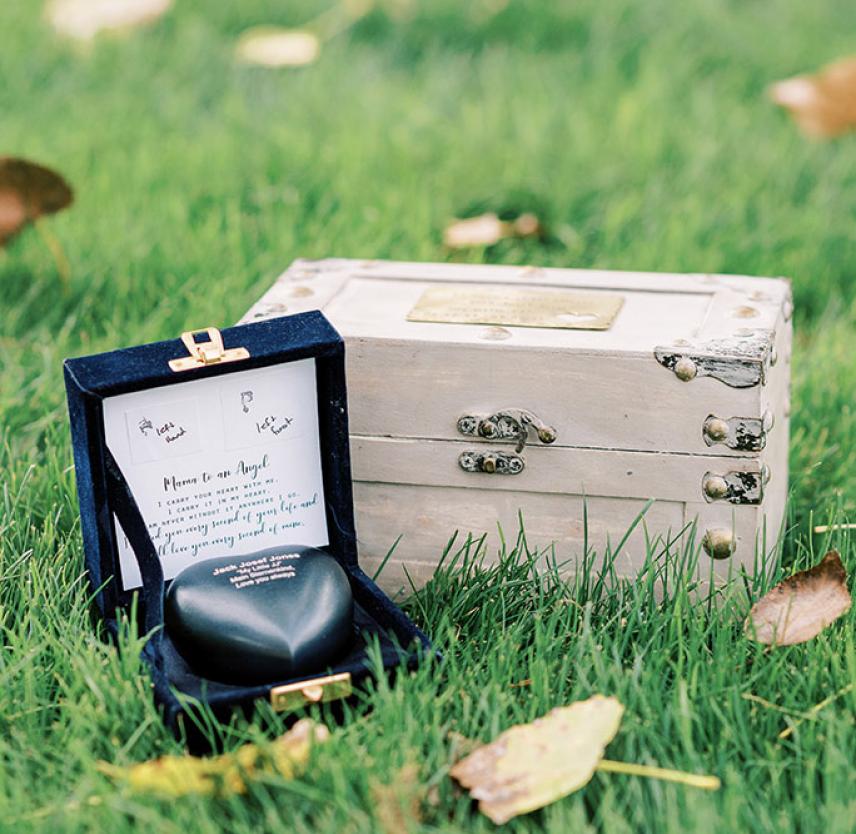 Jack Jones memorial Jack Jones’s urn and memorial with prints of his left foot and left hand