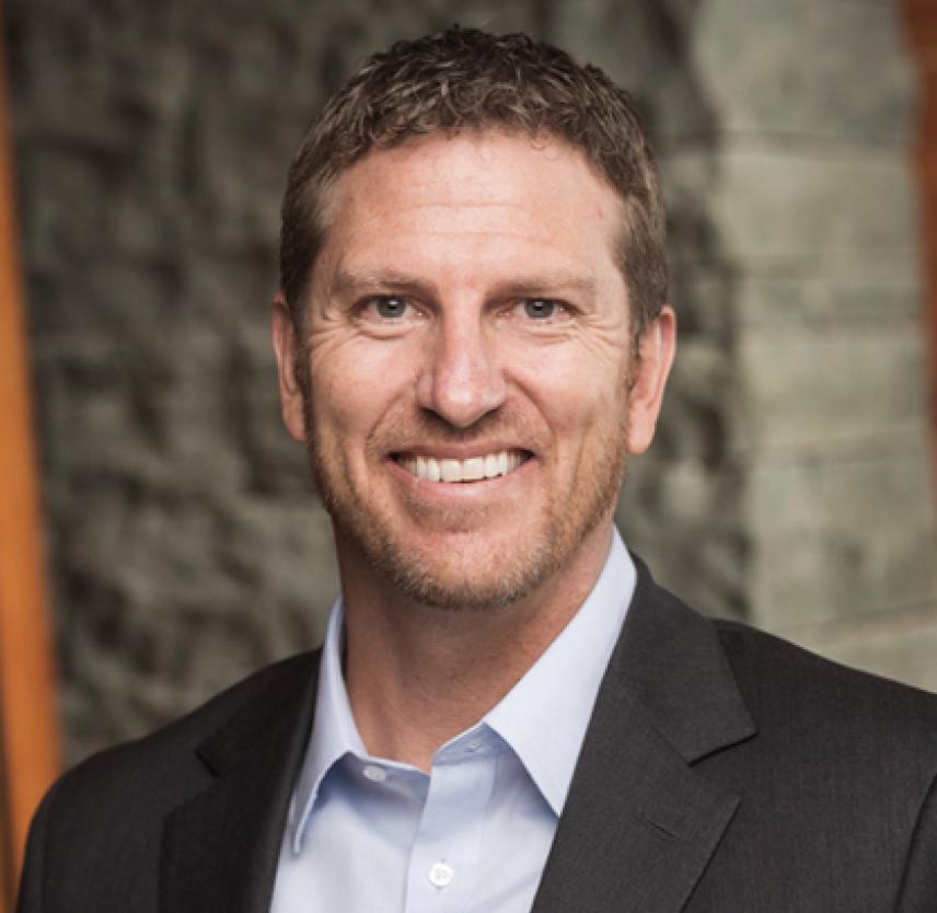 Jon Macaskill smiling at the camera