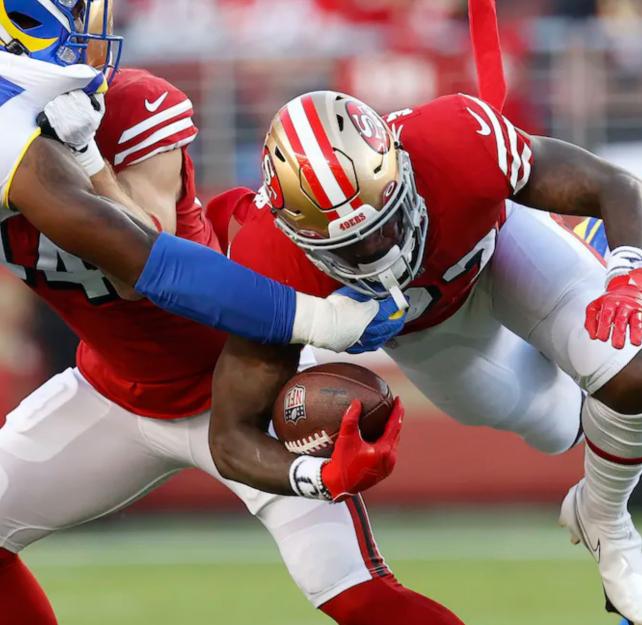 Football player about to get tackled