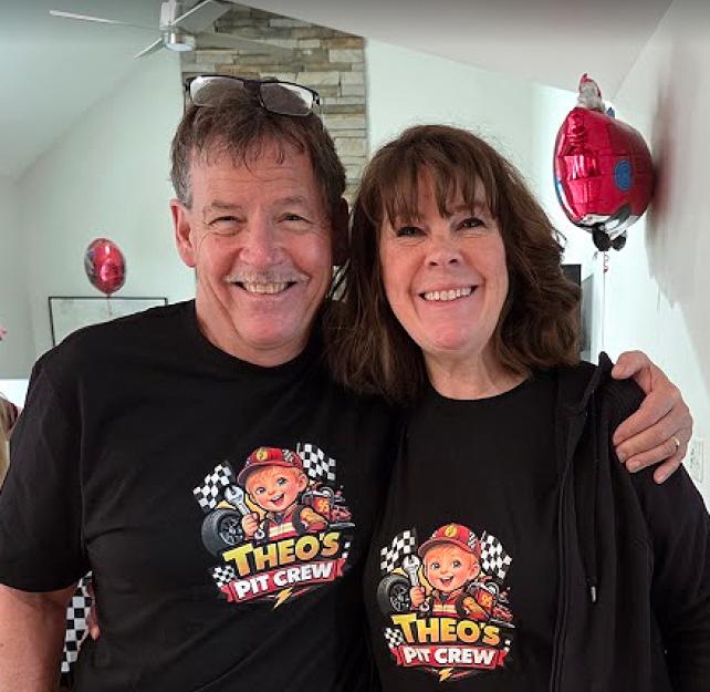 A smiling David Grant and his wife.