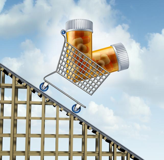Two prescription pill bottles ride a downward slope of a rollercoaster