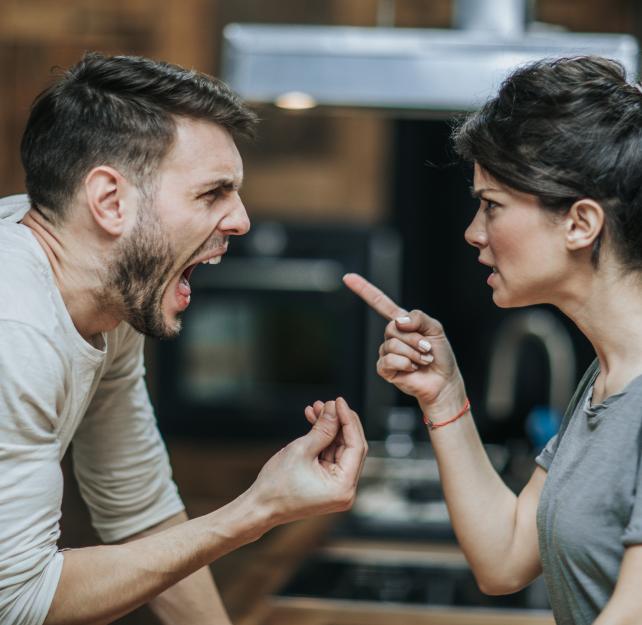 man yelling at woman