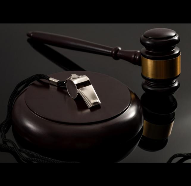 A whistle and a judge's gavel