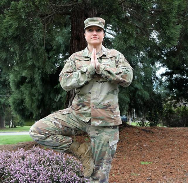 USAF MSgt demonstrating vrikshasana, also known as the tree pose in yoga