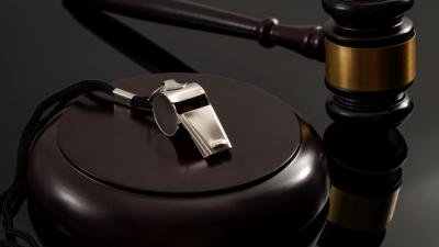 A whistle and a judge's gavel