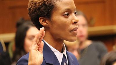 Kimberly Young-McLear raises her right hand to testify